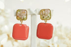 Clous carrés verts et corail