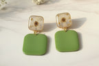 Clous carrés parme et verts
