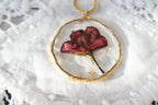 Collier pendentif rond – Fleur bordeaux