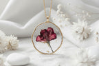Collier pendentif rond – Fleur bordeaux