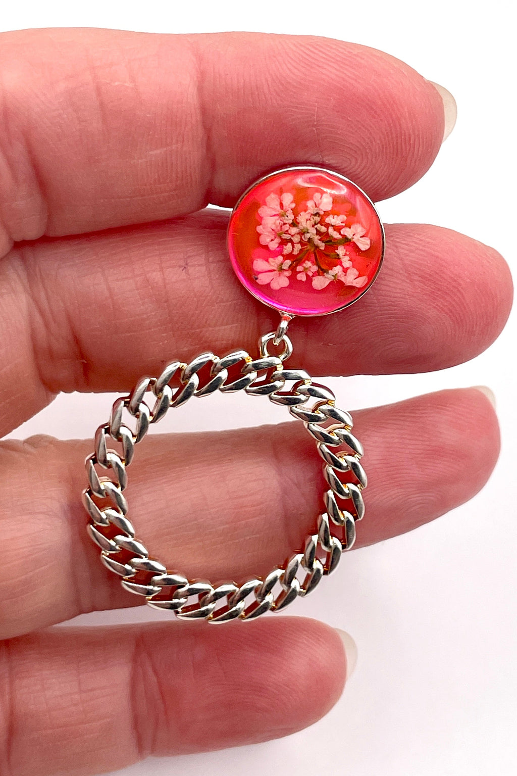 Clous ronds argentés rose fluo