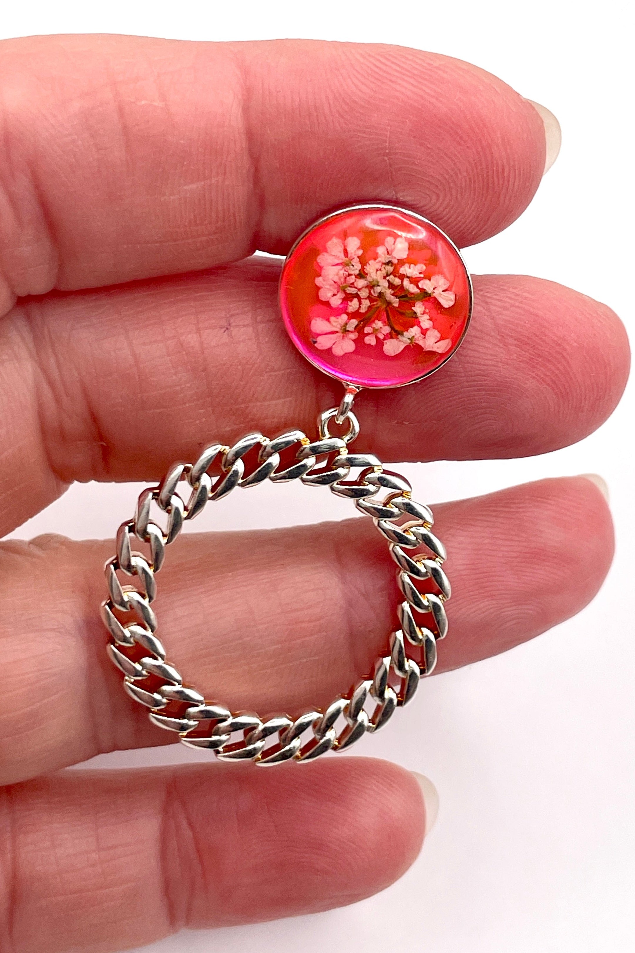 Clous ronds argentés rose fluo