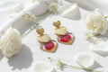 Clous coeurs dorés et rouges