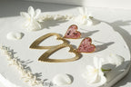 Clous coeurs doubles