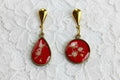 Boucles d'oreilles pendantes asymétriques - Gouttes rouges